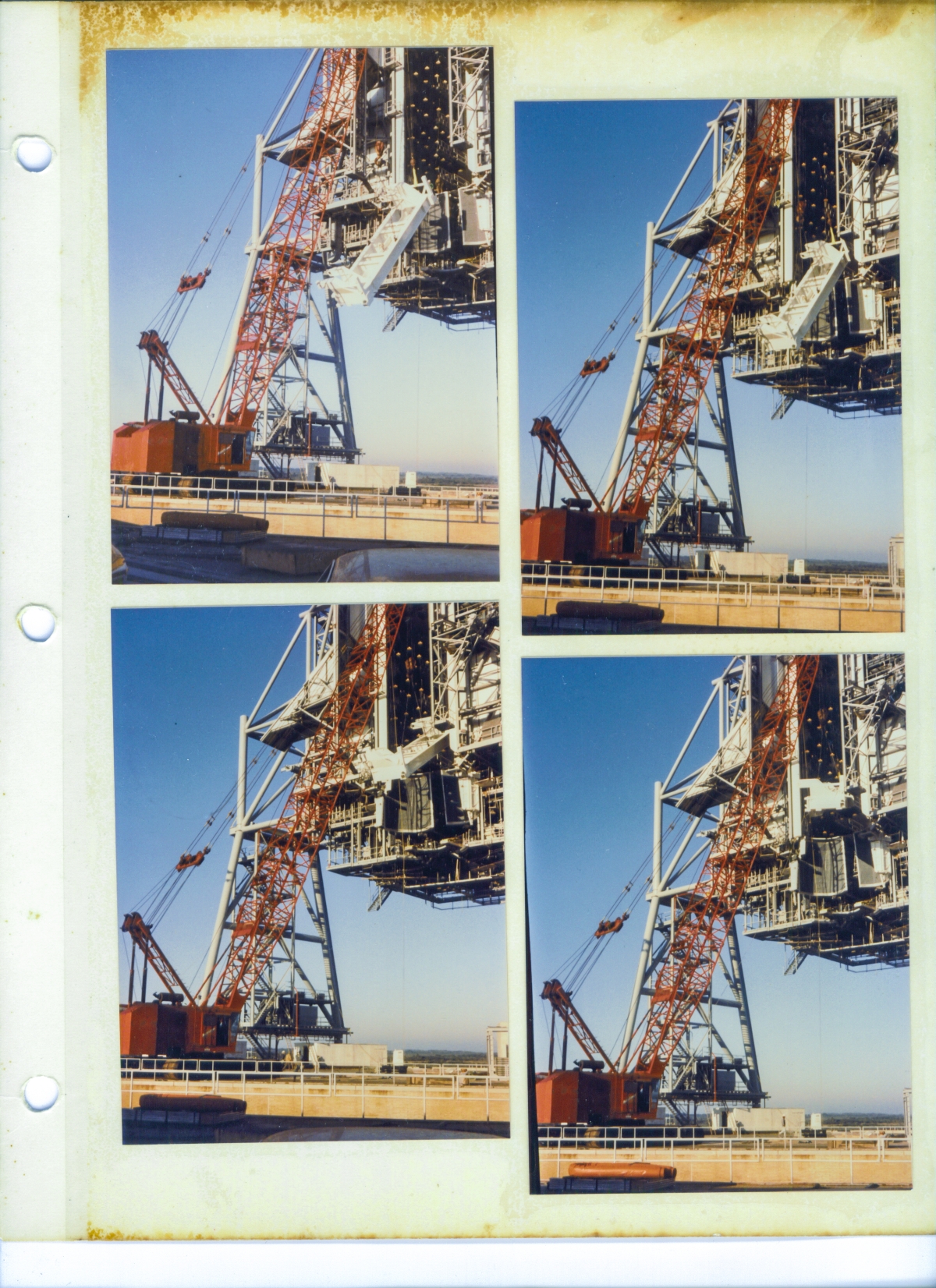 Payload Ground Handling Mechanism Bridge Beam lift at Launch Complex 39-B, Kennedy Space Center, Florida. Ivey Steel's team of union ironworkers from Local 808 working with a crane operator who is a master of his craft, reorient and insert the bridge beam into the lower reaches of the Payload Changeout Room, prior to additional reorientation and then lifting it further, to its final destination on support rails just beneath the roof of the PCR.